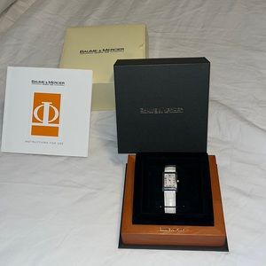 Baumé & Mercier Hampton 10 with mother of pearl face ladies watch.